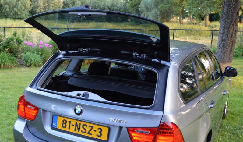 BMW 318i Touring Business | Bi-Xenon | Navi | Climate  | Cruise | PDC | Trekhaak | 16” LM. full